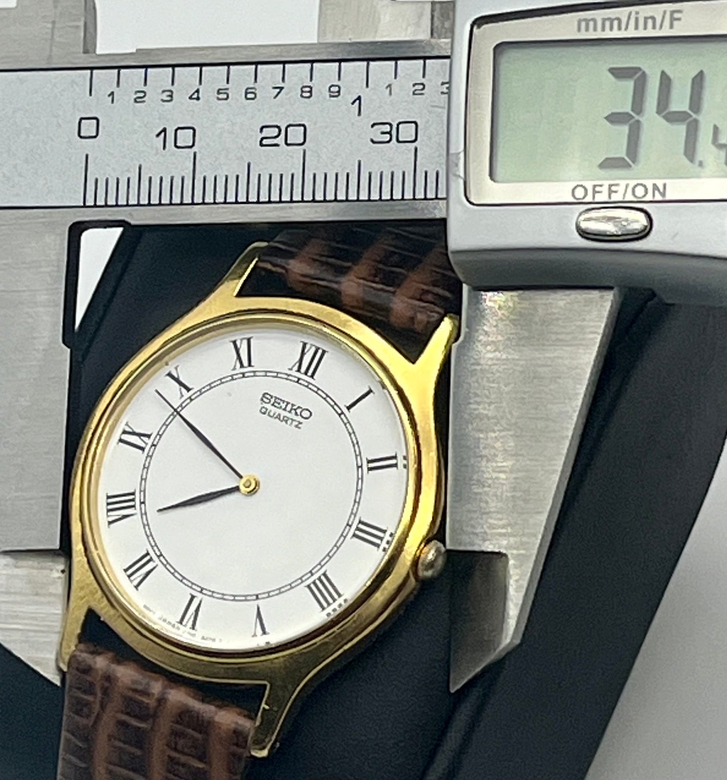 Seiko gold tone Roman numeral