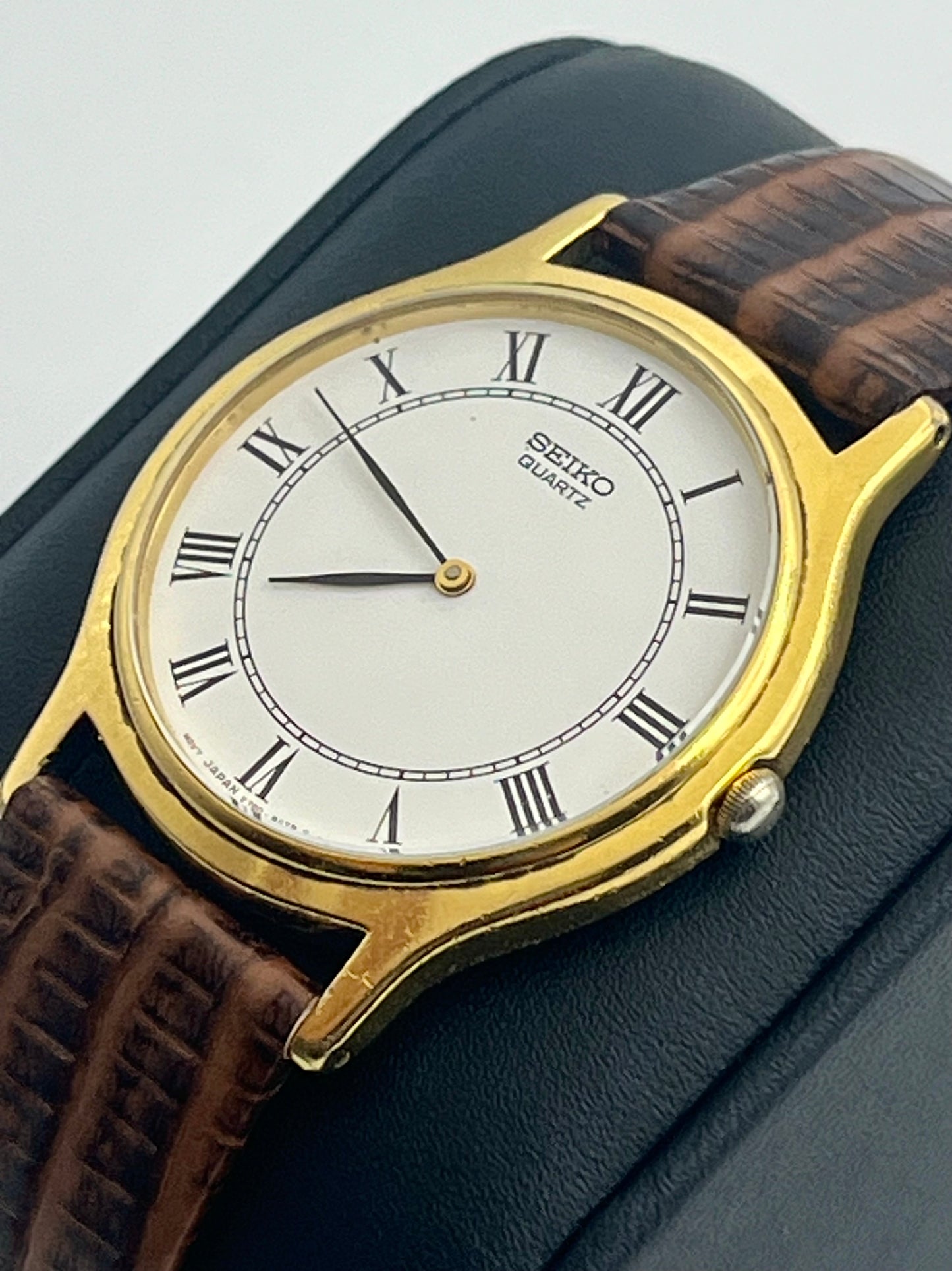 Seiko gold tone Roman numeral