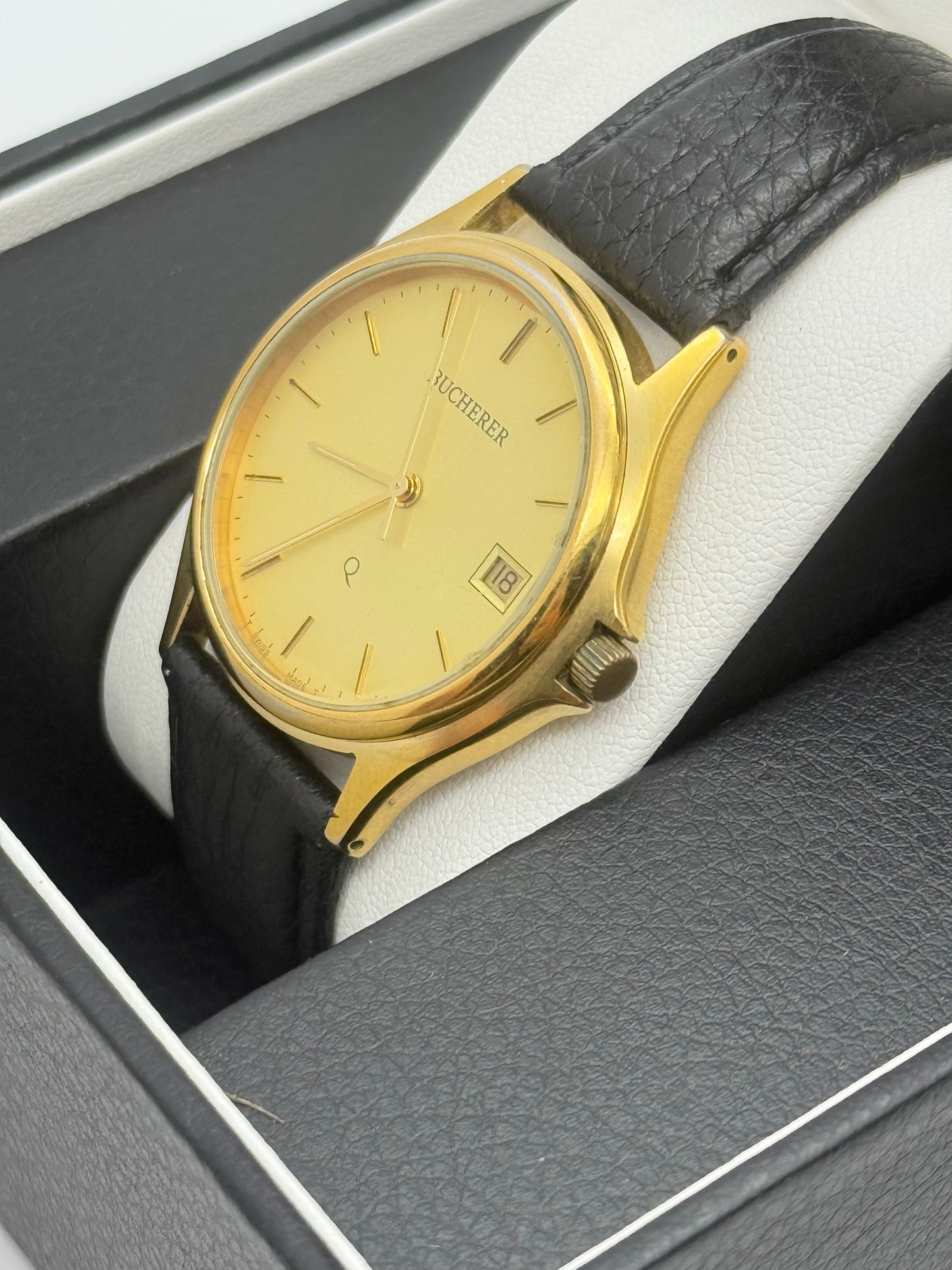 Bucherer Swiss watch, 36mm size case, 8in wrist leather band