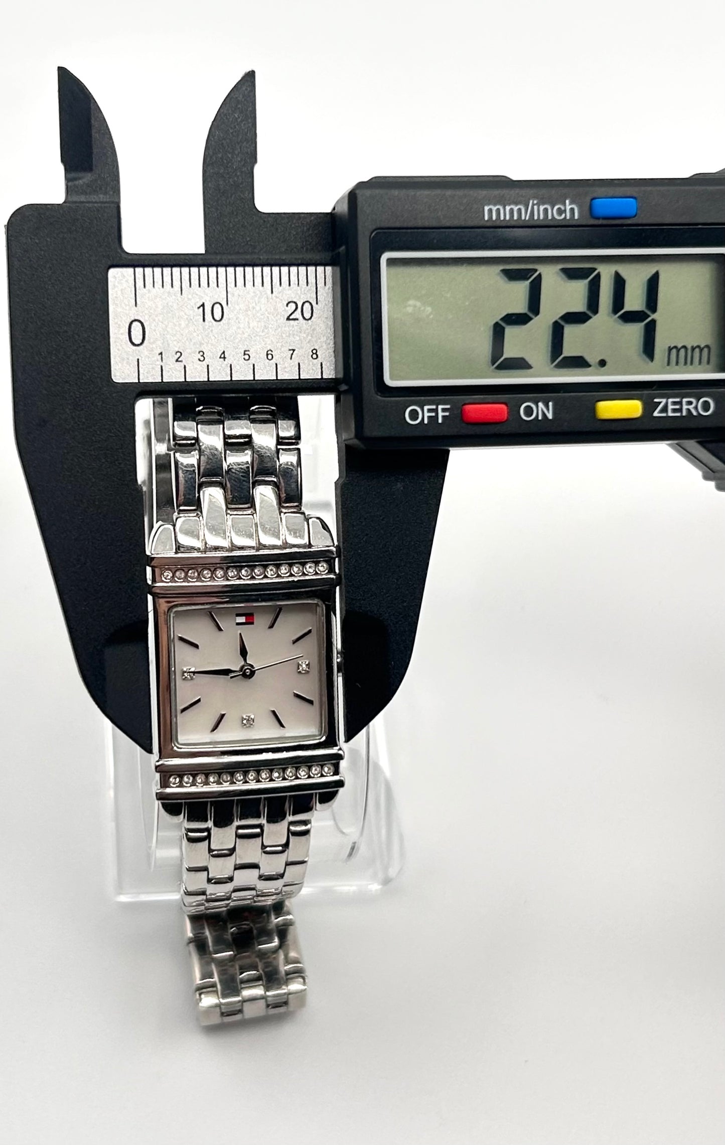 Tommy Hilfiger women watch, 22mm size case, 6.5 size wrist bracelet.