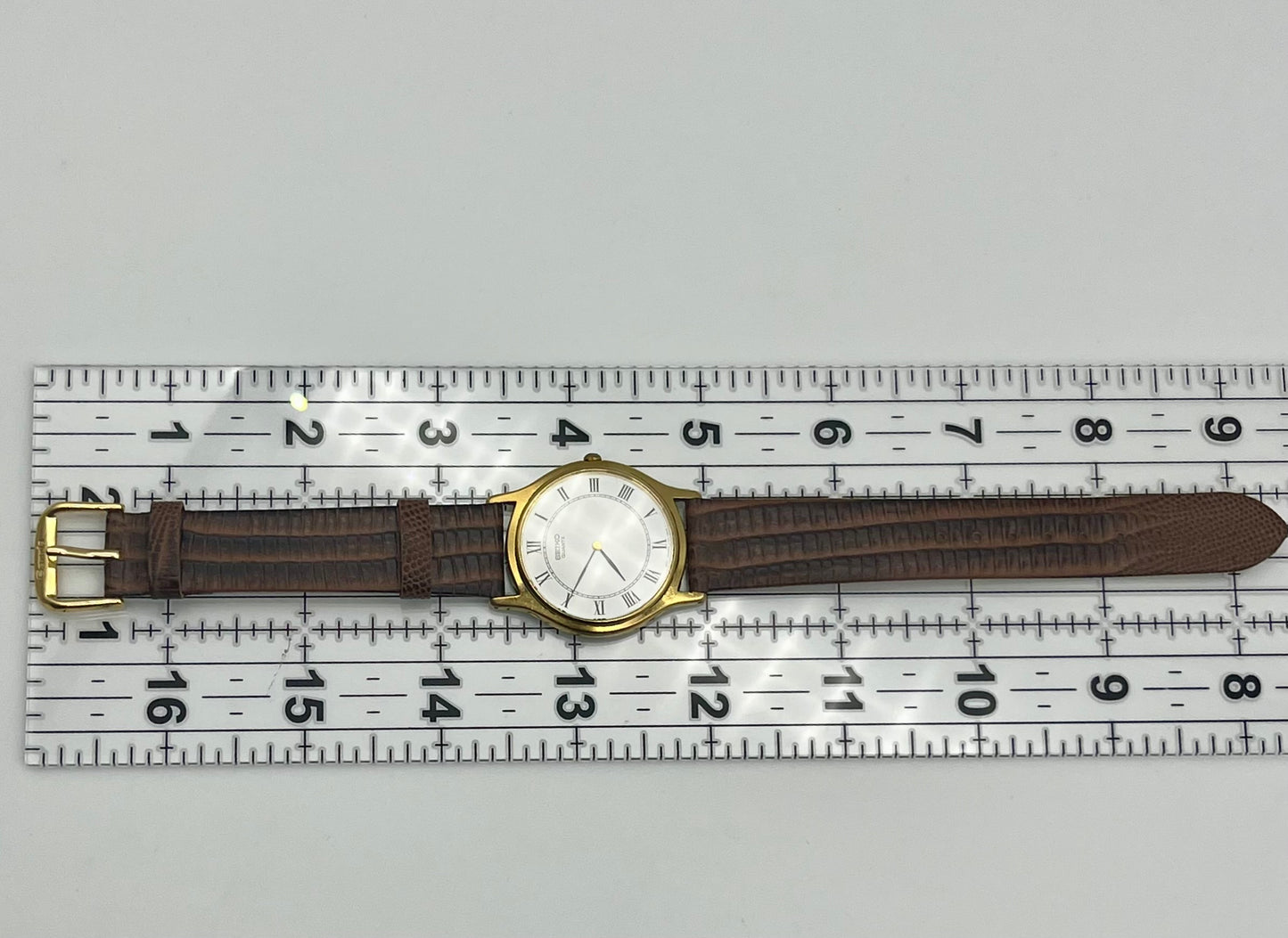 Seiko gold tone Roman numeral