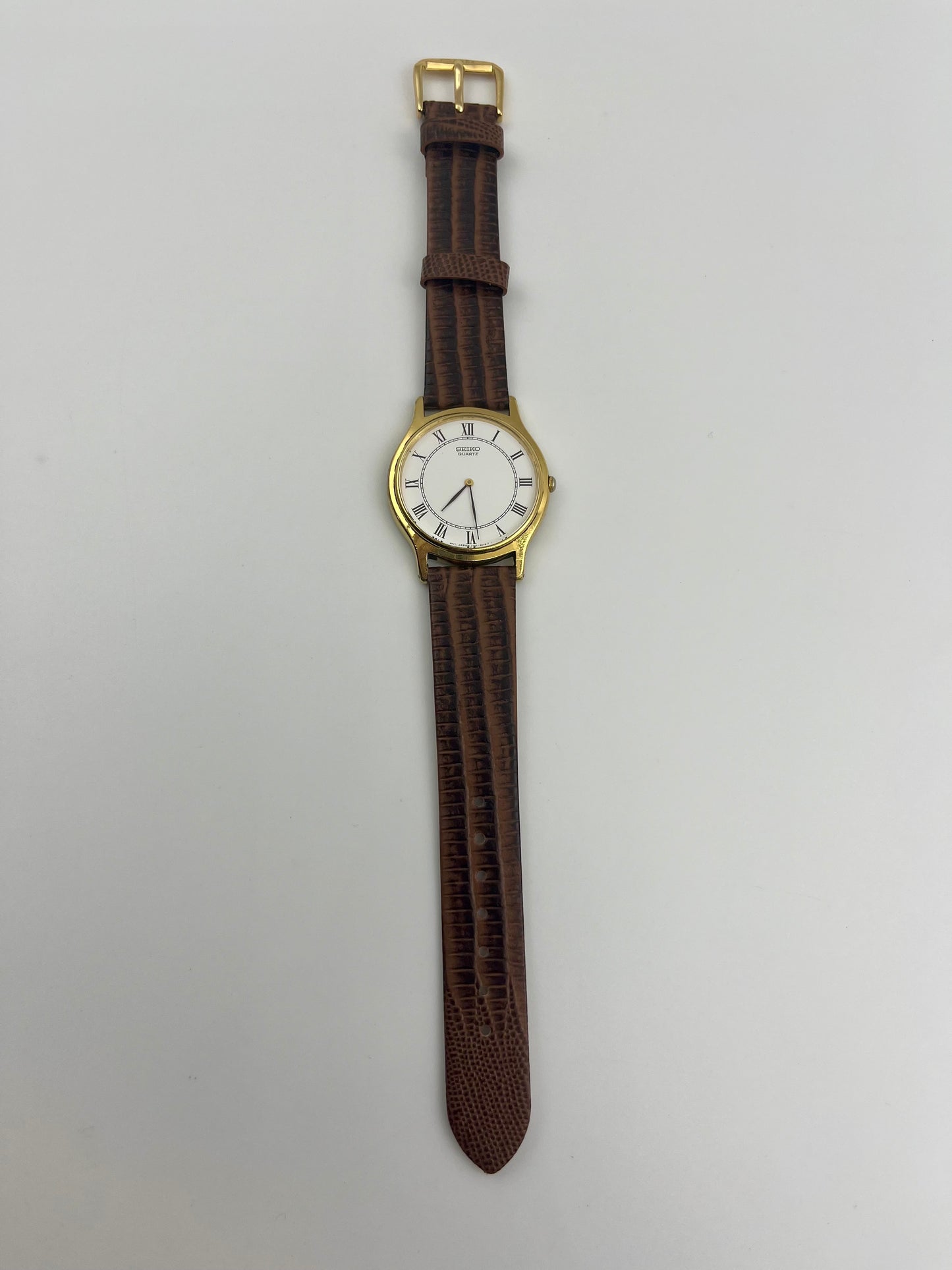 Seiko gold tone Roman numeral