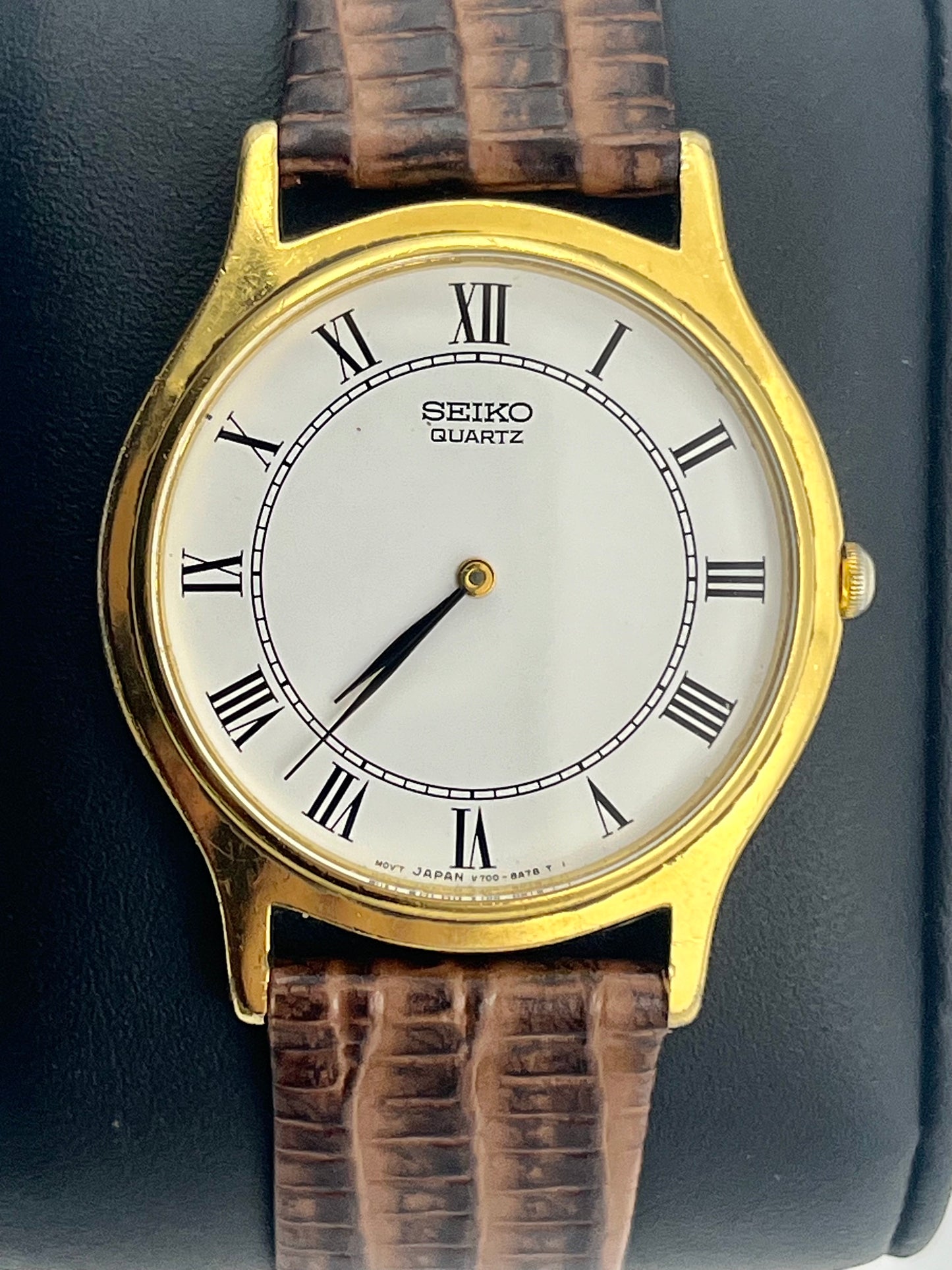 Seiko gold tone Roman numeral