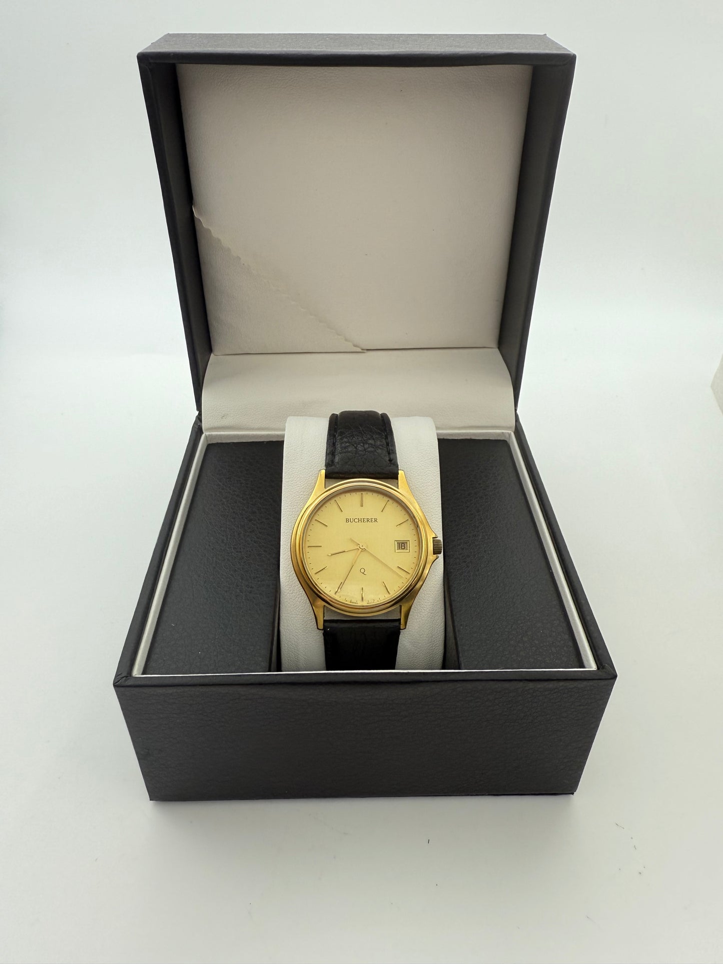 Bucherer Swiss watch, 36mm size case, 8in wrist leather band