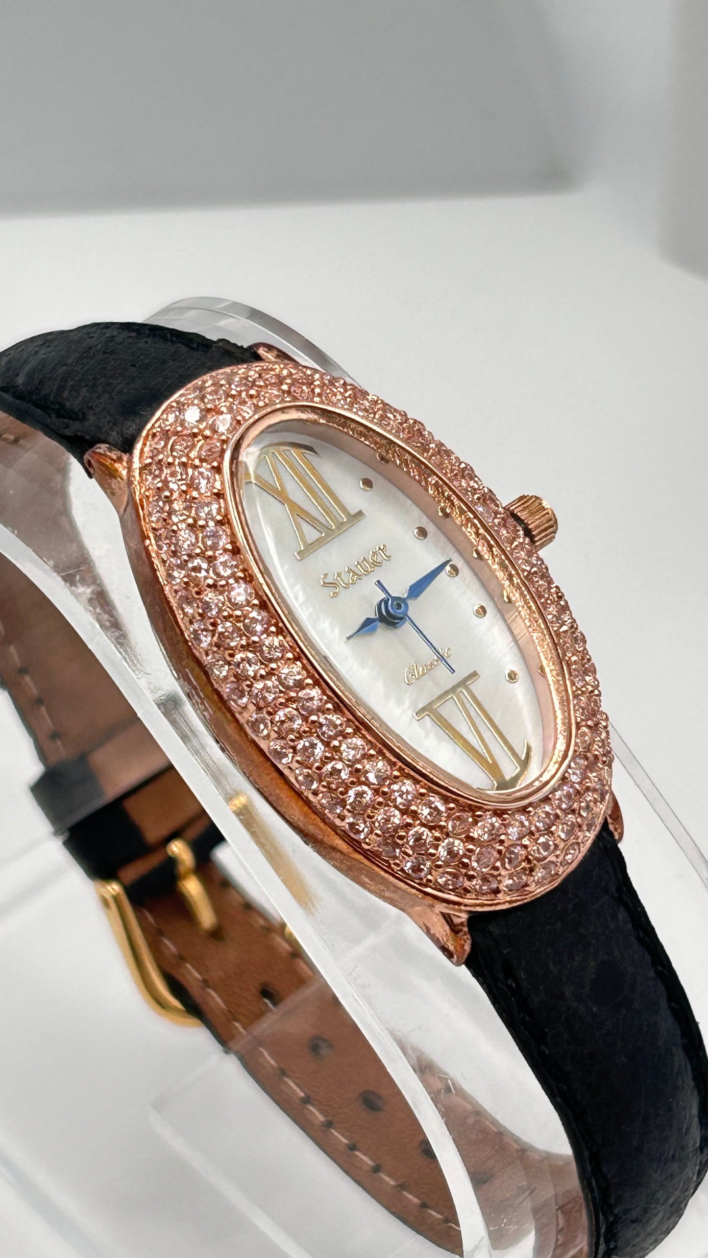 Stauer rose gold tone watch, 22mm size case, 7in size band.