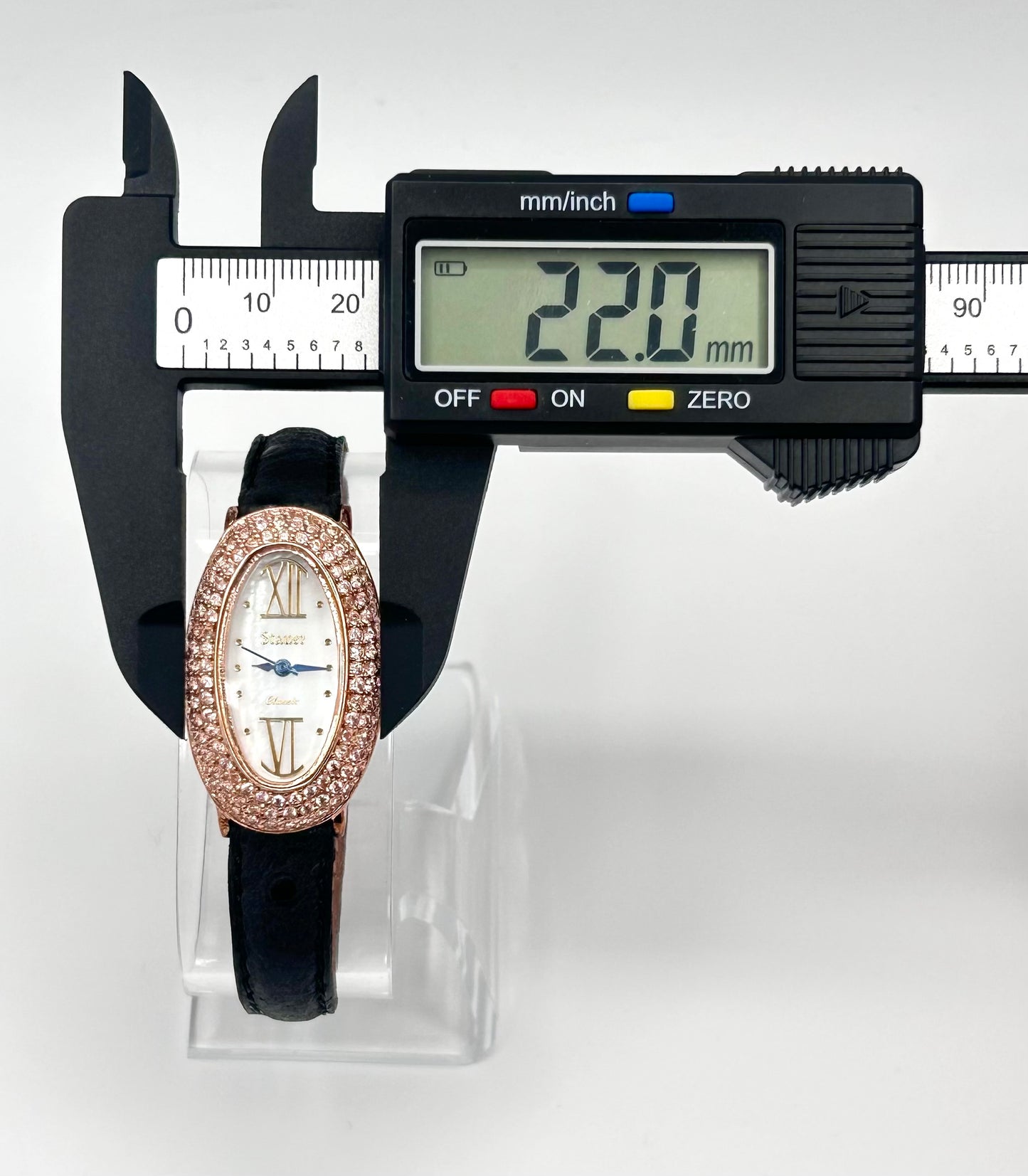 Stauer rose gold tone watch, 22mm size case, 7in size band.
