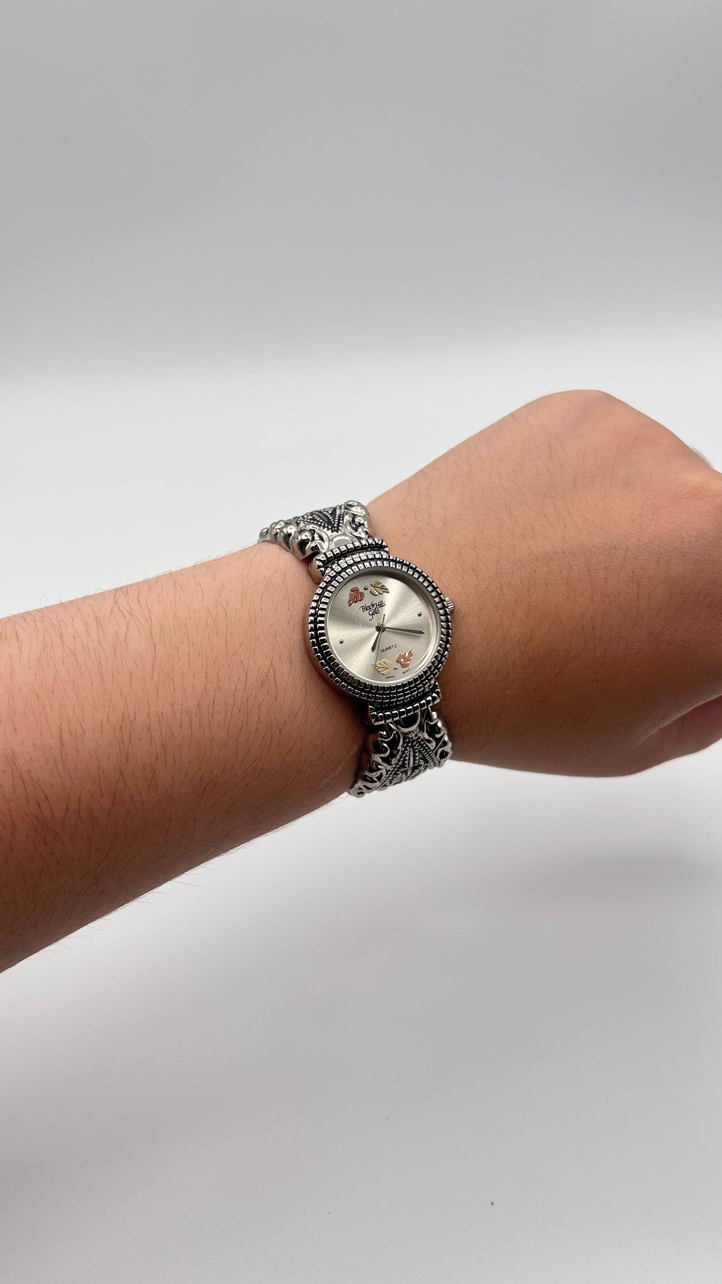 Vintage Black Hills Gold 12k and stainless steel cuff watch, 28mm size case, 5.5 in size wrist cuff