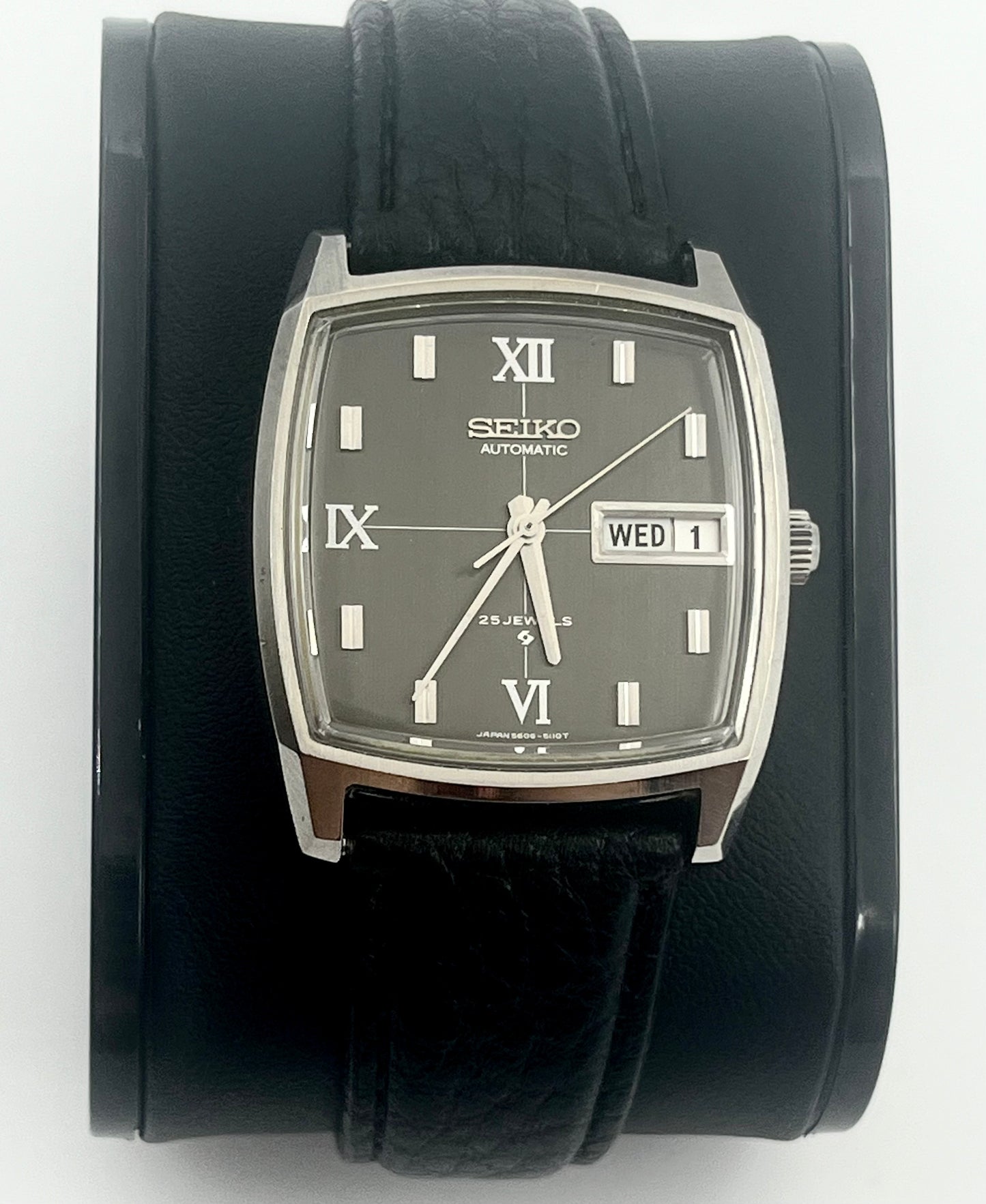 Vintage 1969 rare and elegant automatic Lord Matic Seiko watch, 37mm size case, 8in long leather band with the case watch