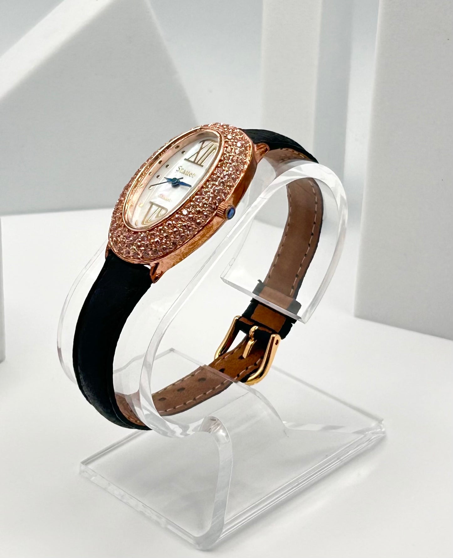 Stauer rose gold tone watch, 22mm size case, 7in size band.