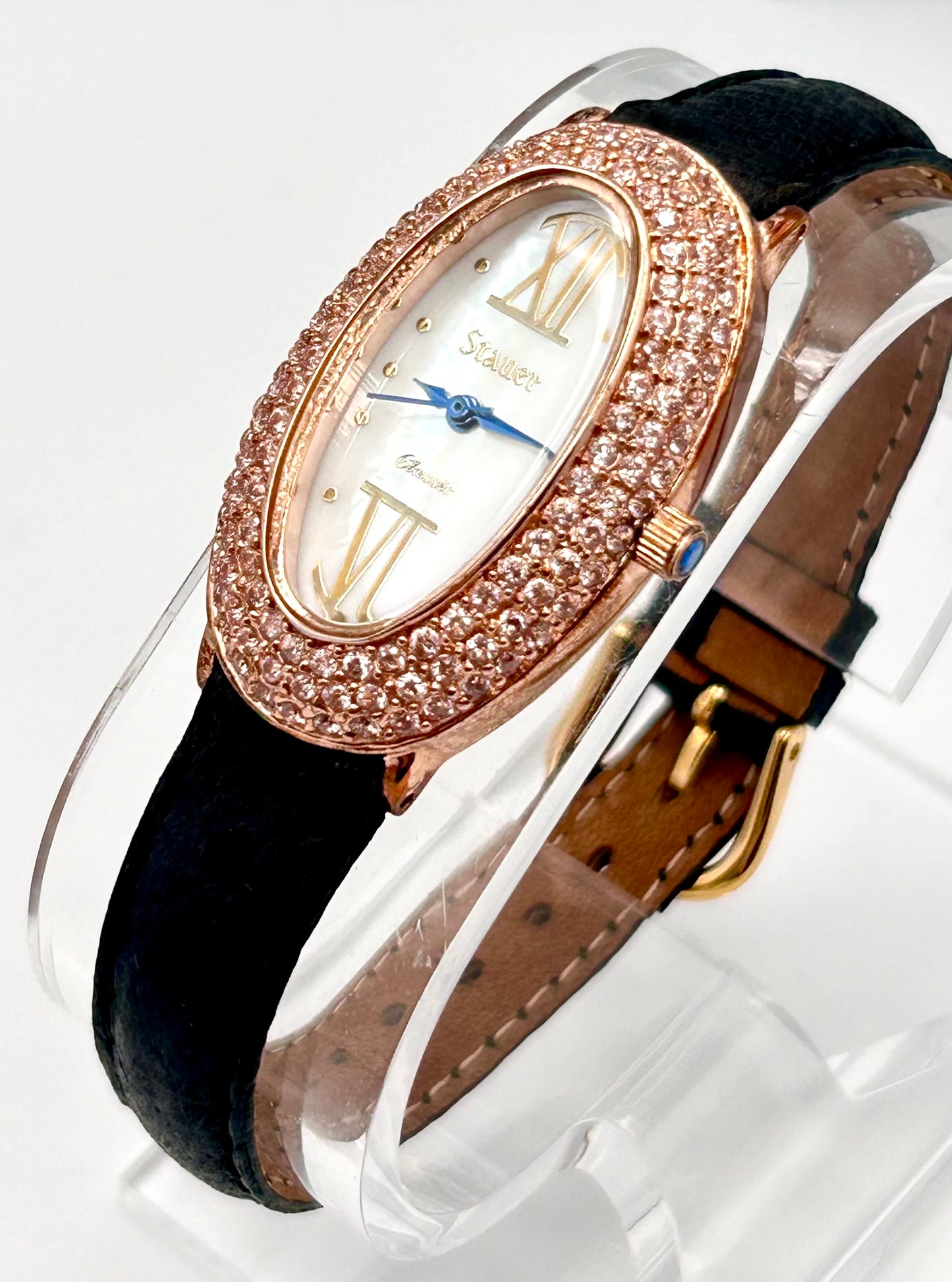 Stauer rose gold tone watch, 22mm size case, 7in size band.