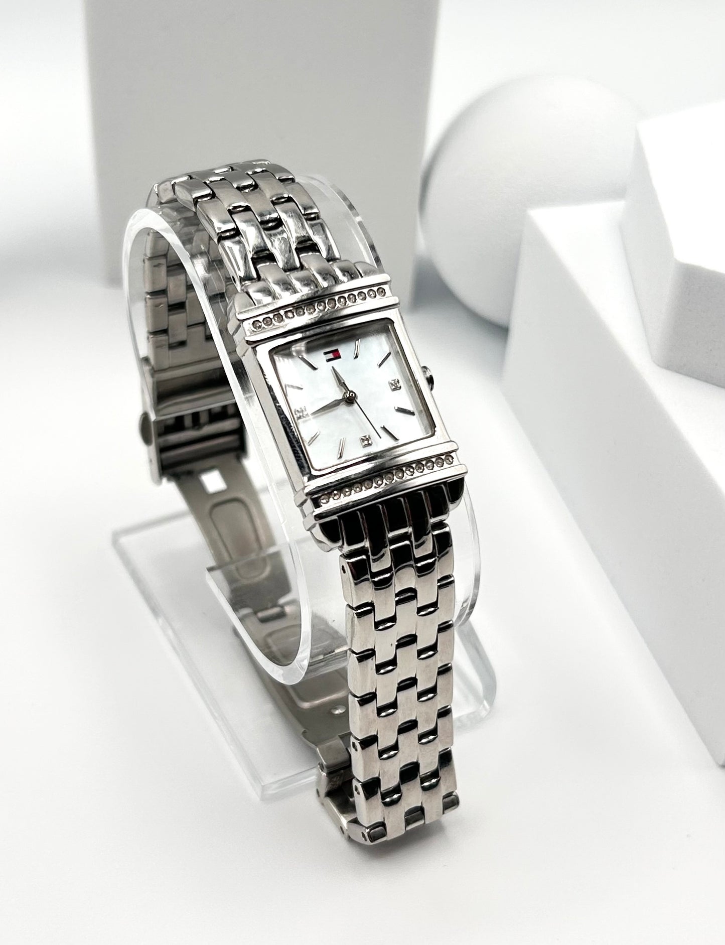 Tommy Hilfiger women watch, 22mm size case, 6.5 size wrist bracelet.