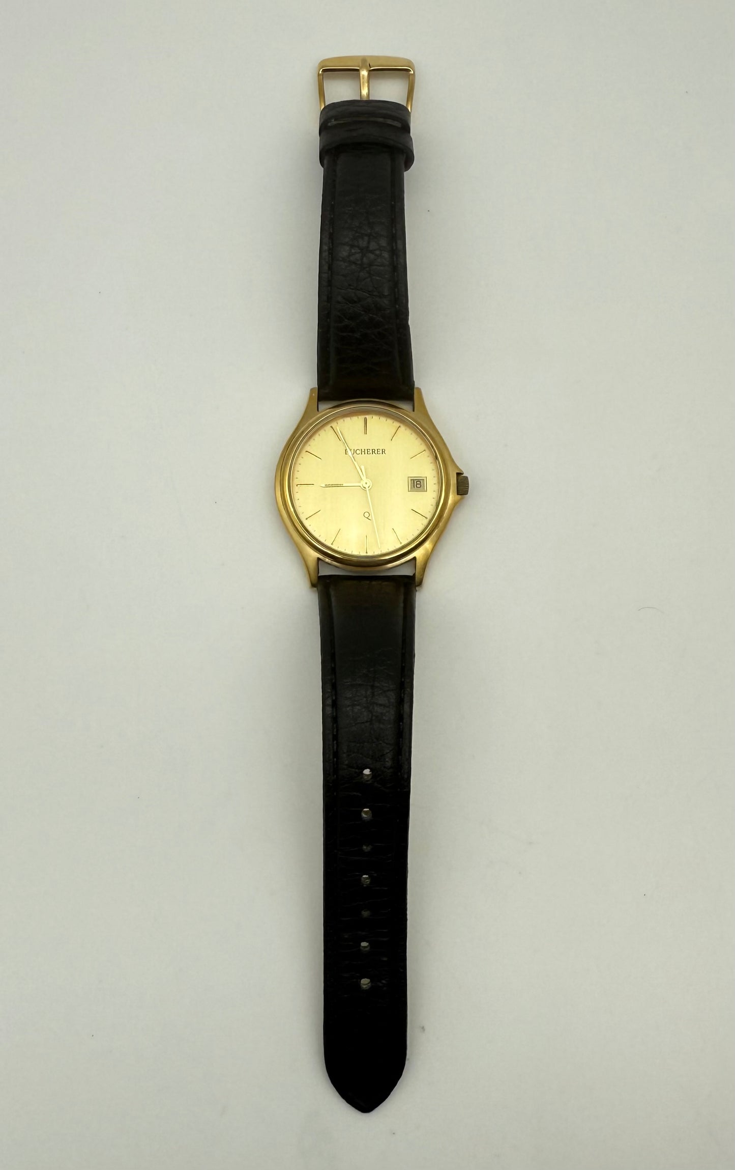 Bucherer Swiss watch, 36mm size case, 8in wrist leather band