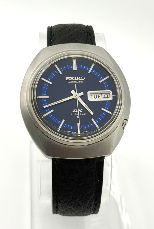 Vintage 1971 Seiko DX automatic watch, 39mm size case, 8in wrist leather band.