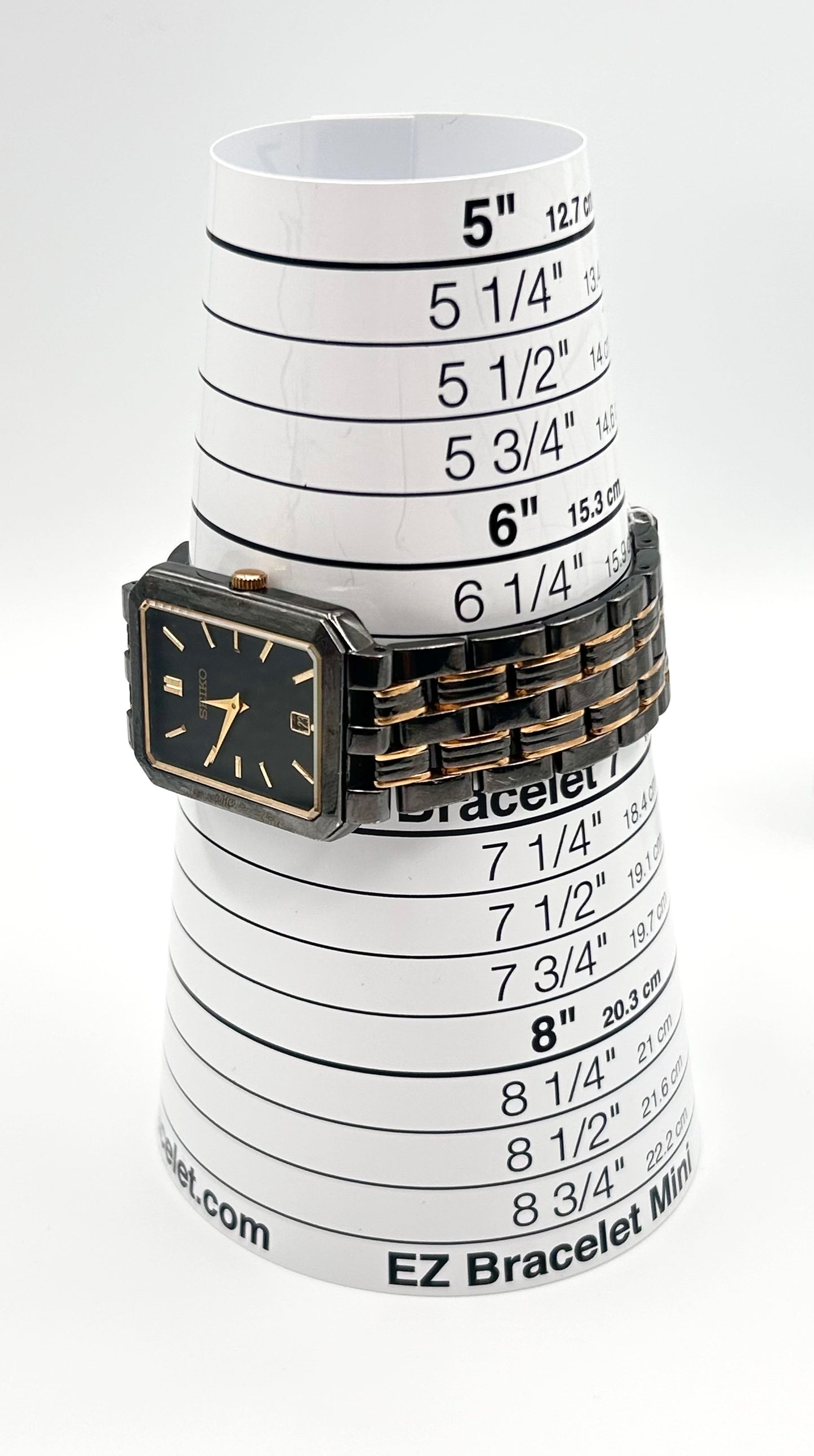 Vintage 1990 Seiko  black and gold tone watch 25mm size case, 6.5in size wrist bracelet.