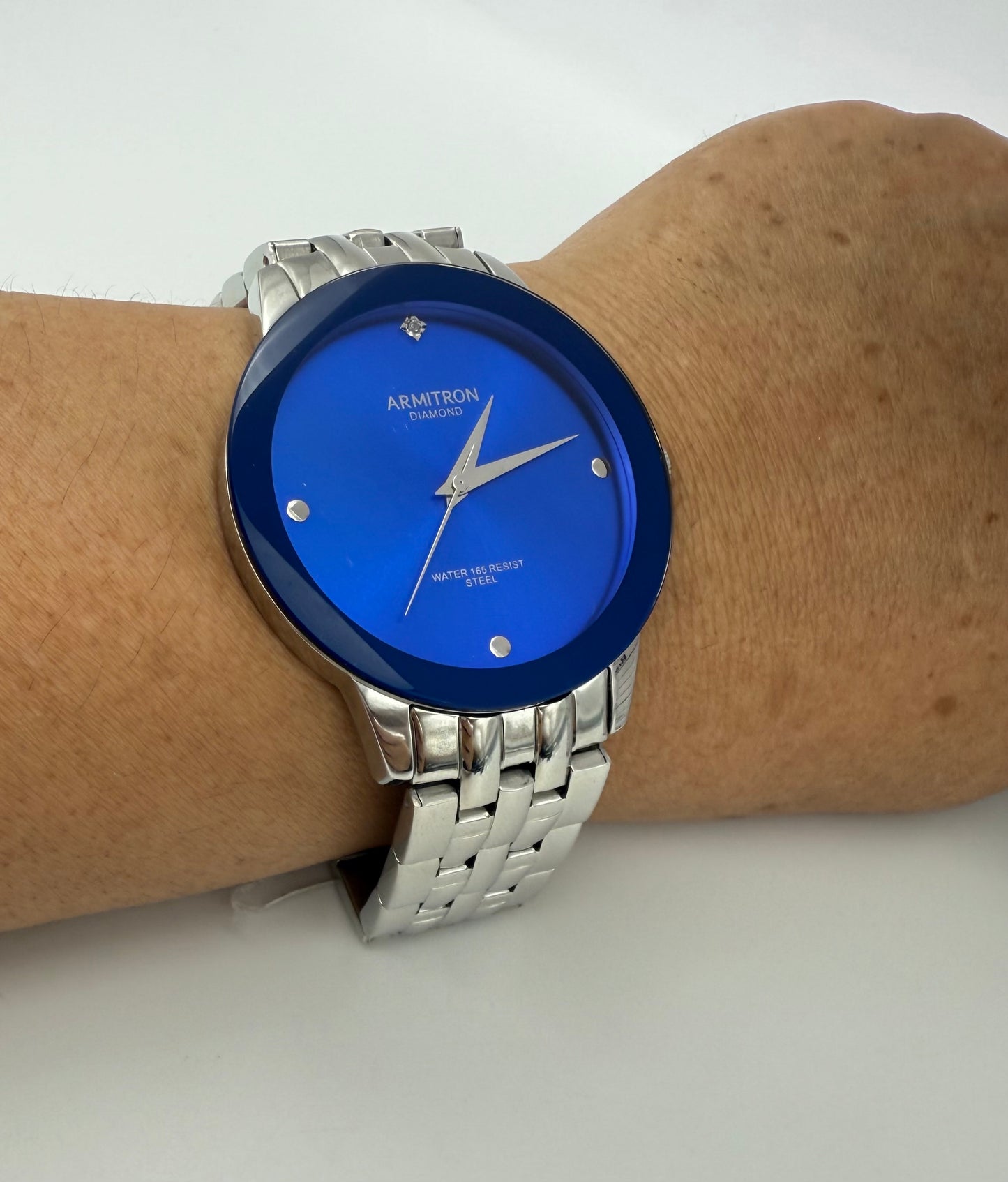 Armitron blue dial watch,42mm size case, 7in size wrist bracelet