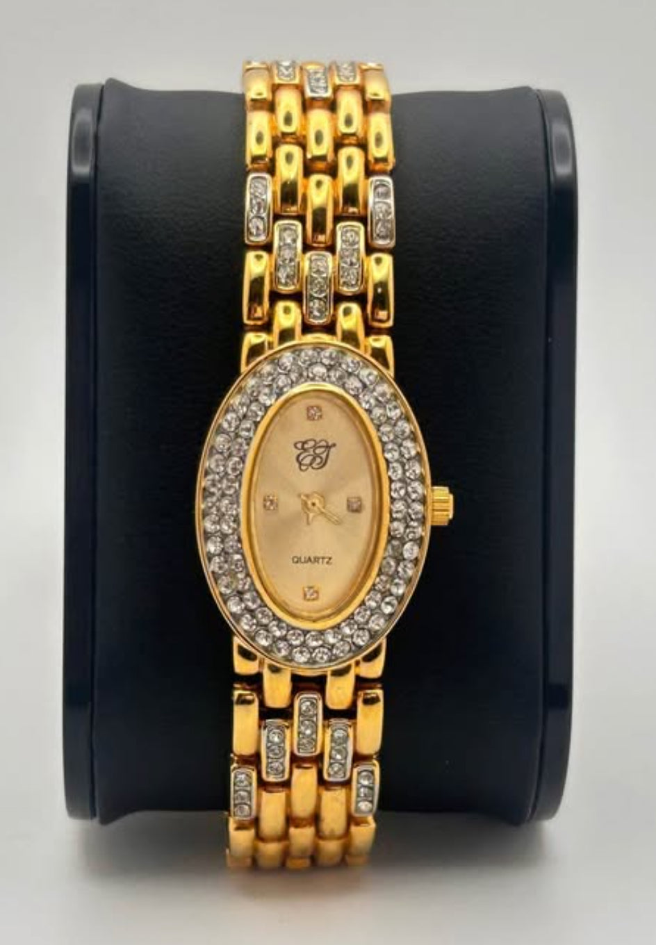Vintage Elizabeth Taylor Rhinestone Watch gold tone, 21mm size case, 7.5in size wrist bracelet.