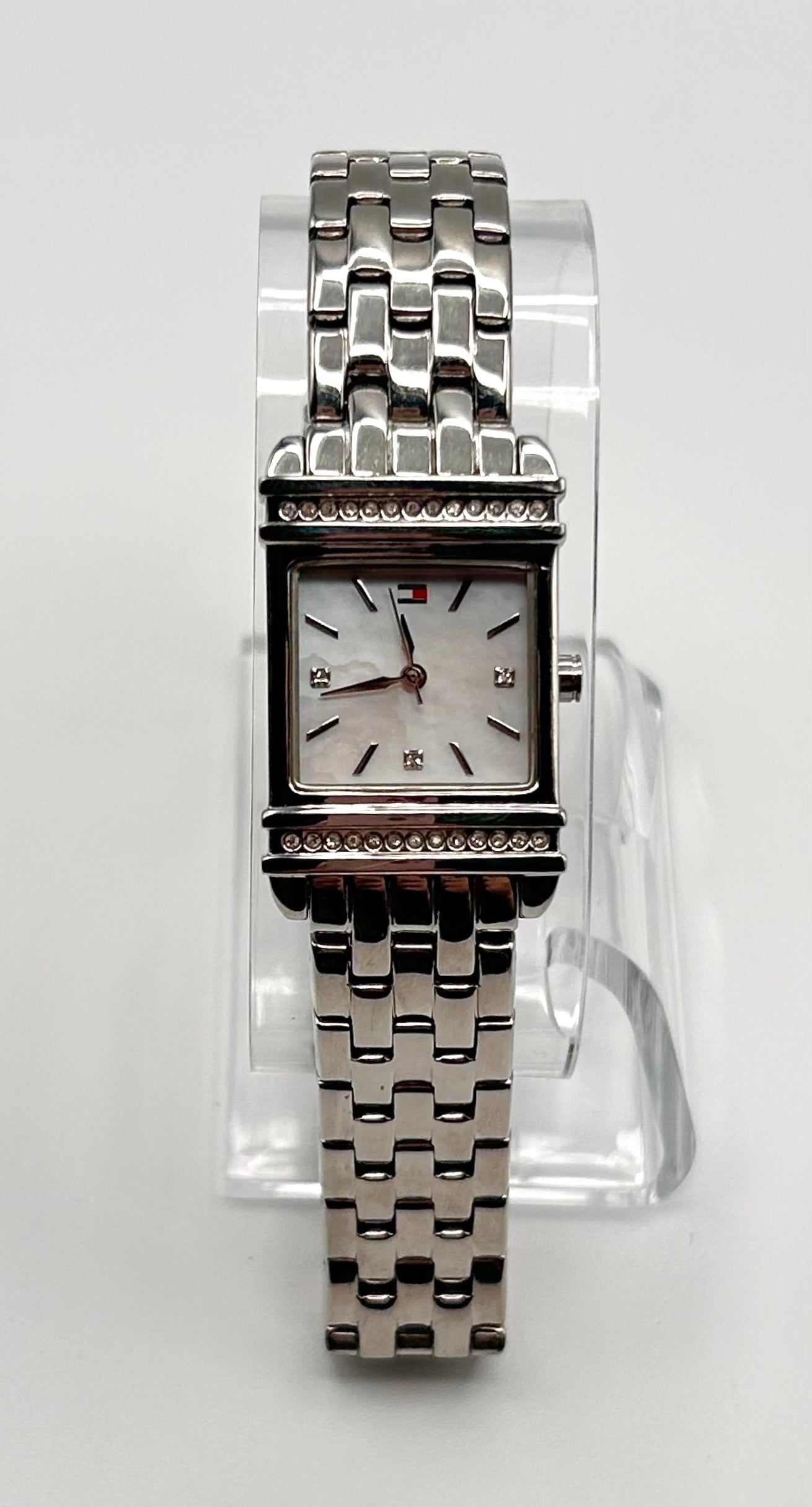 Tommy Hilfiger women watch, 22mm size case, 6.5 size wrist bracelet.