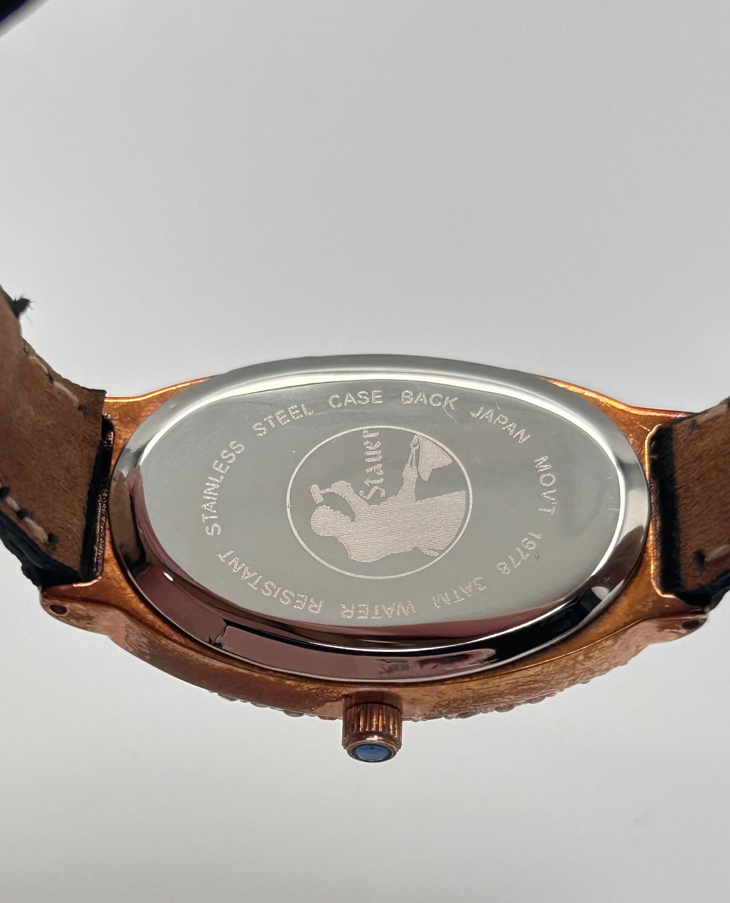 Stauer rose gold tone watch, 22mm size case, 7in size band.
