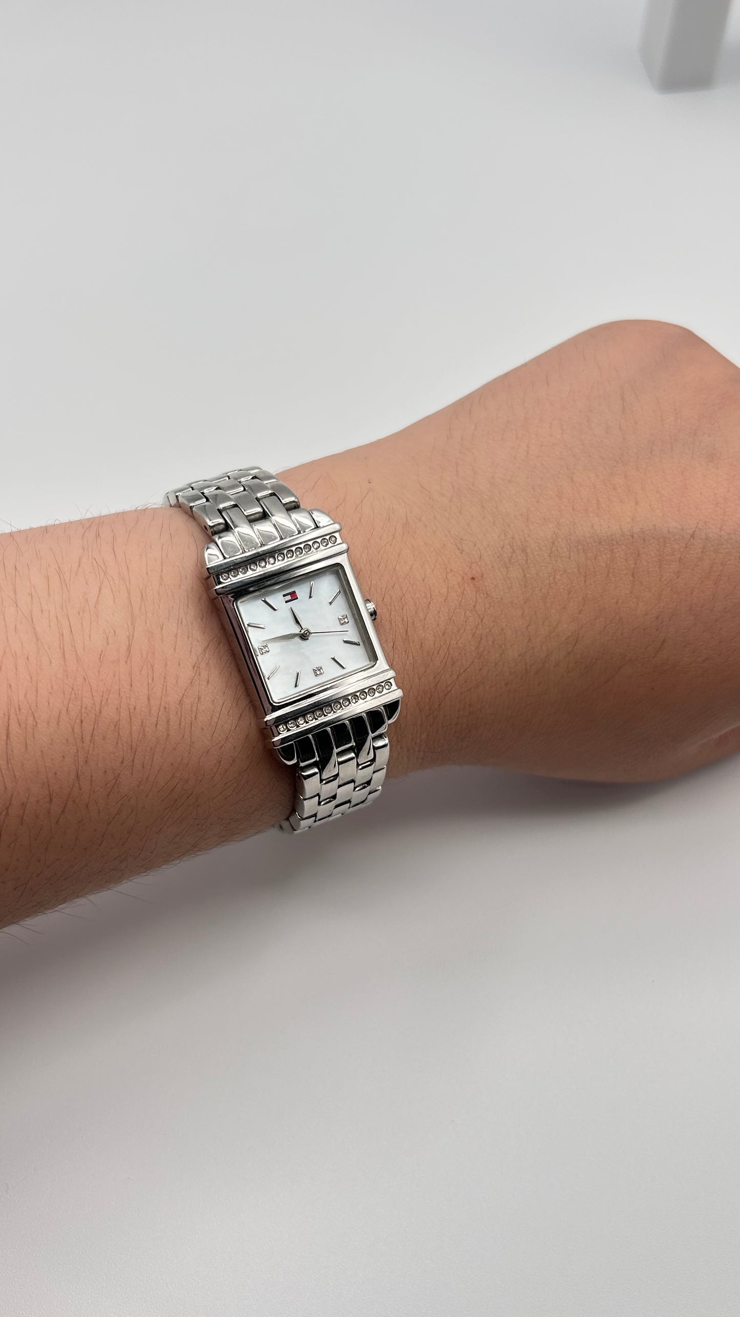 Tommy Hilfiger women watch, 22mm size case, 6.5 size wrist bracelet.