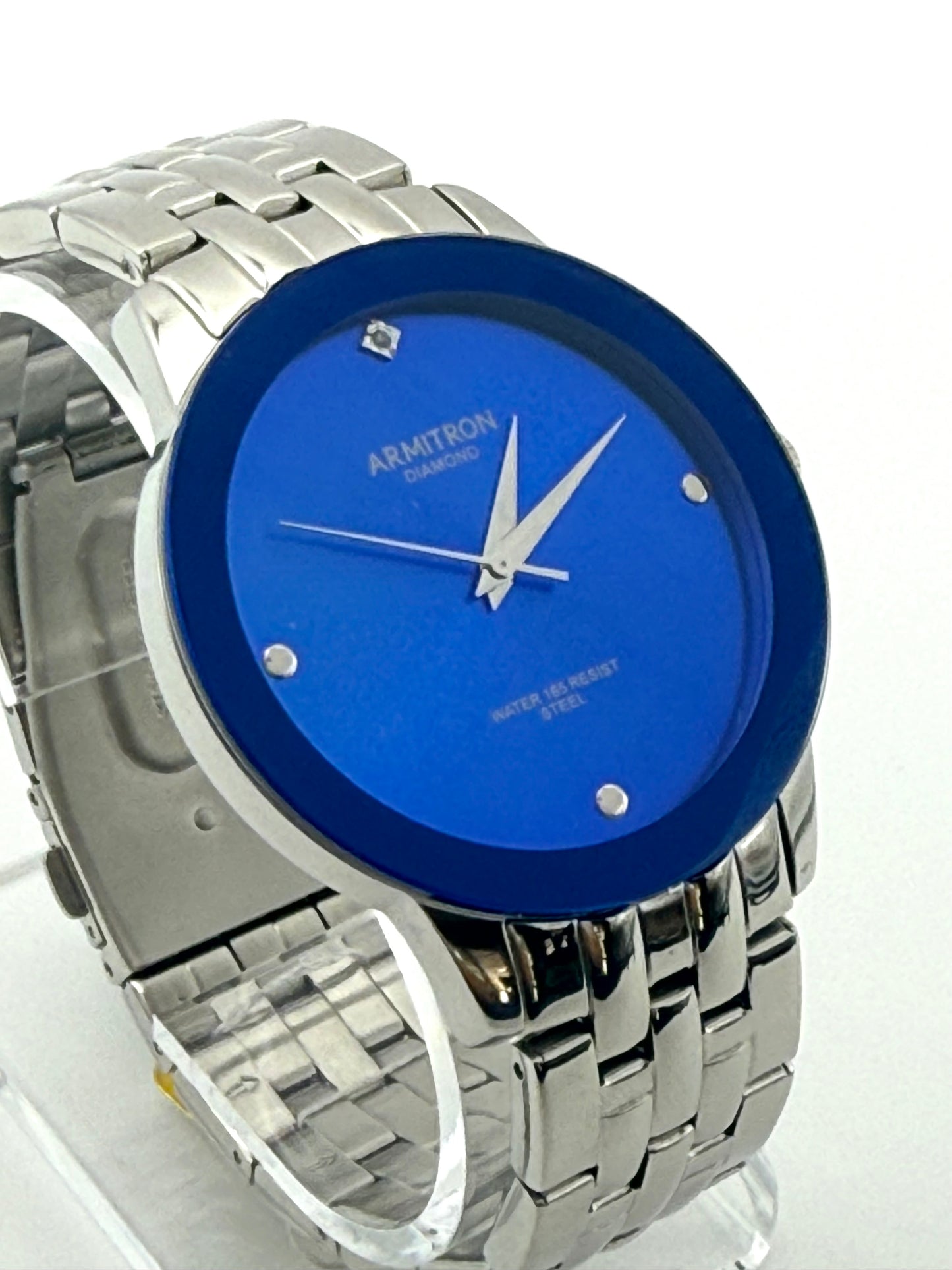 Armitron blue dial watch,42mm size case, 7in size wrist bracelet