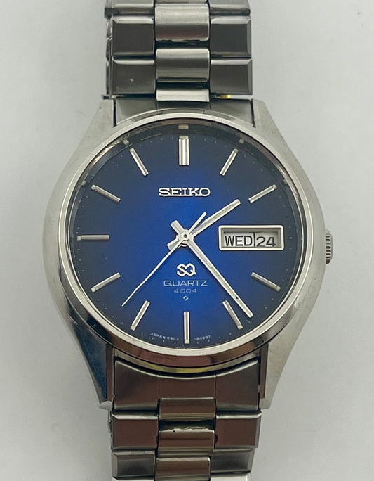 Vintage 1975 Seiko SQ 4004 watch, 35mm size case, 8in size wrist bracelet