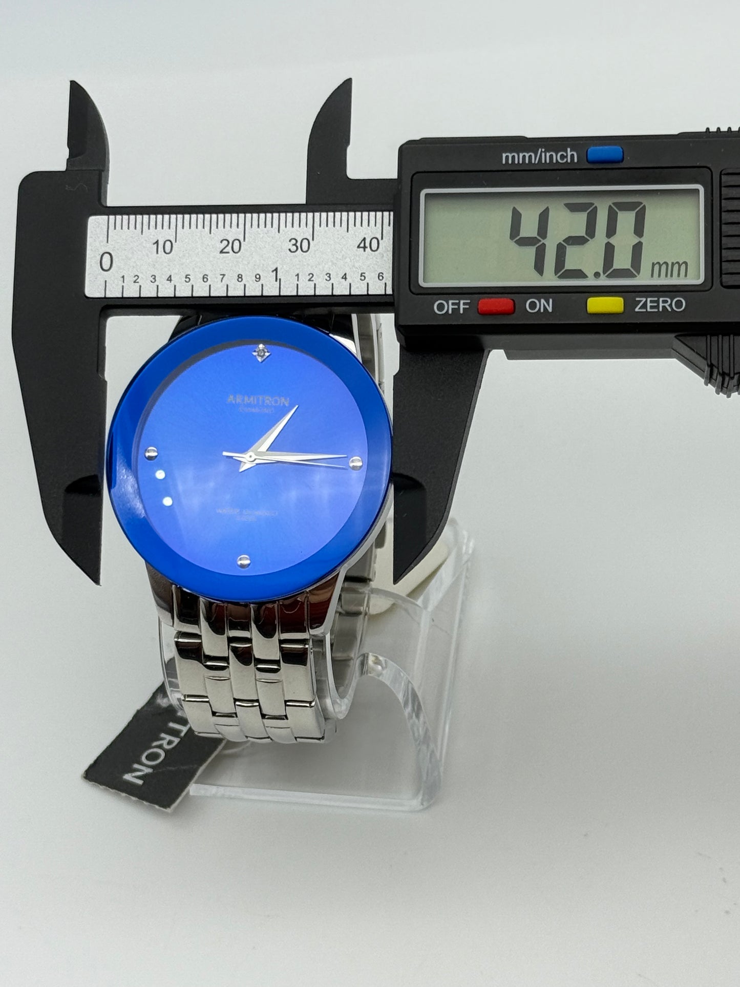 Armitron blue dial watch,42mm size case, 7in size wrist bracelet