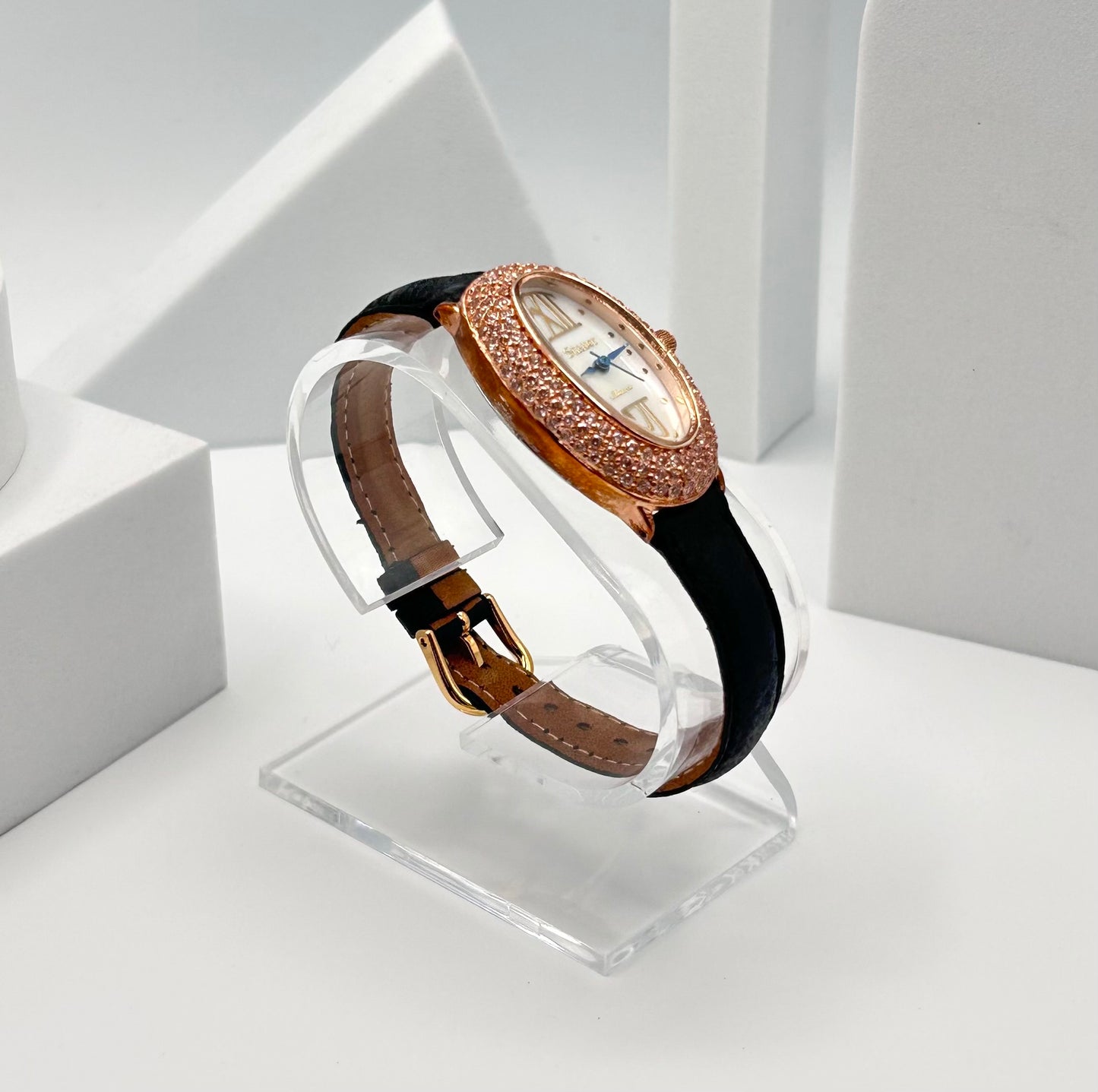 Stauer rose gold tone watch, 22mm size case, 7in size band.