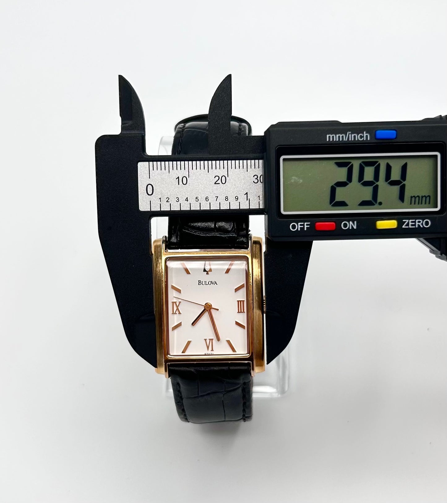 Bulova watch gold tone, 30mm size case, 7.5in size wrist leather band